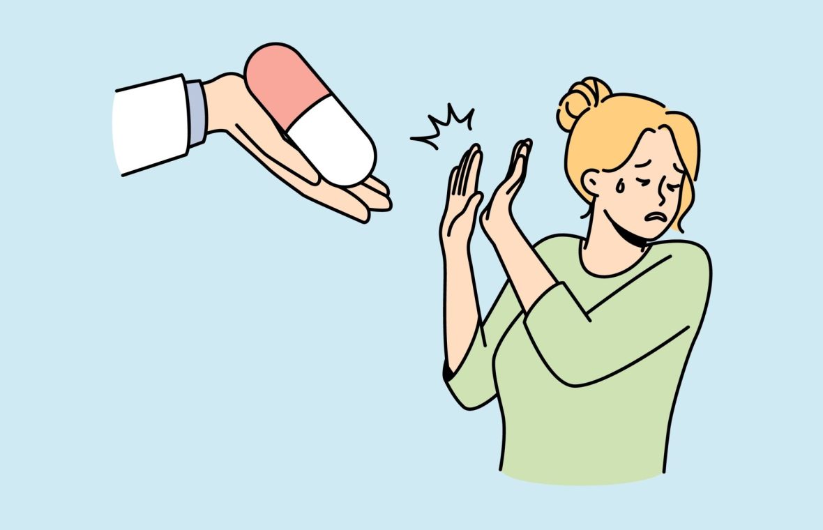 femeie care refuză un medicament cu corticosteroizi