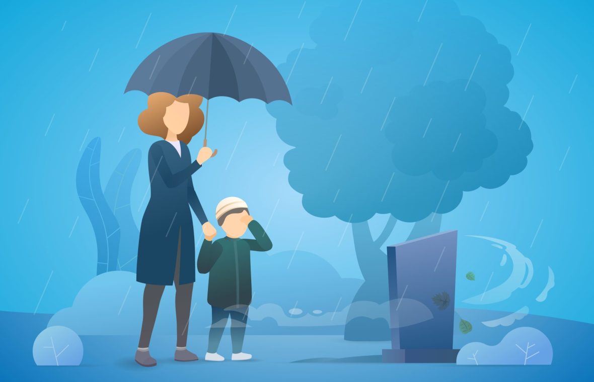 Doliu în familie, mamă cu copilul în fața unui mormânt