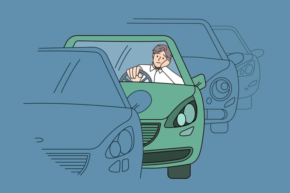 poluarea in trafic dupa doua ore apar leziuni cerebrale. barbat trist la volanul masinii, in trafic aglomerat