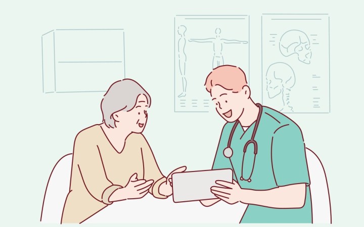 depistarea precoce a cancerului. medic și pacient bucuroși de rezultatele analizelor